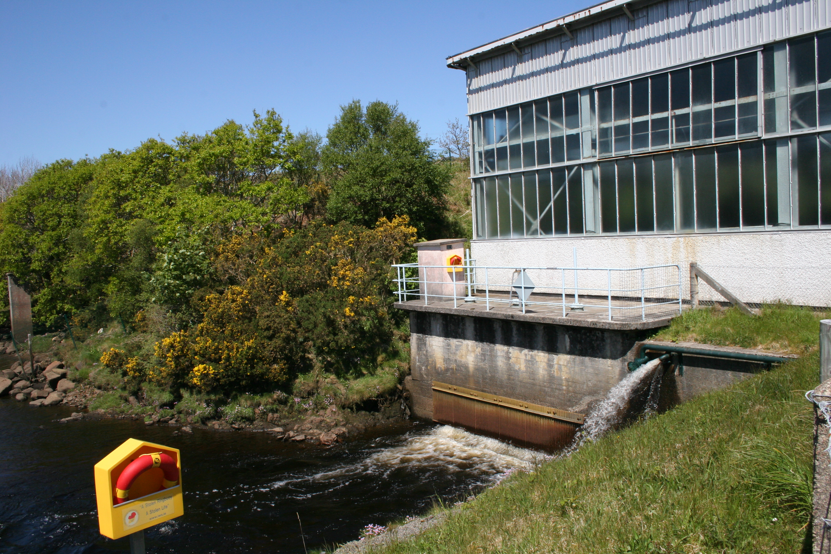 View of Clady power station along with river Clady