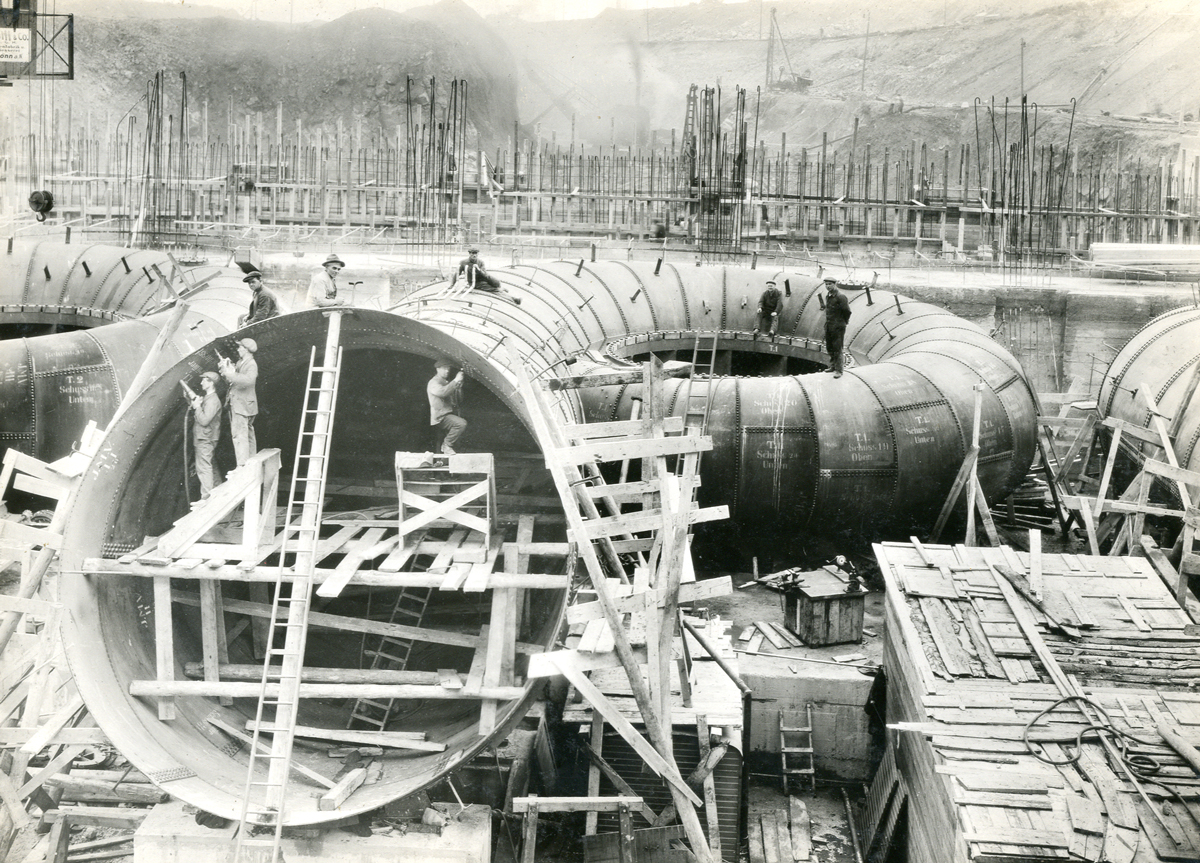 Historic construction scene showing workers and engineering works during the development of the Shannon Scheme at Ardnacrusha