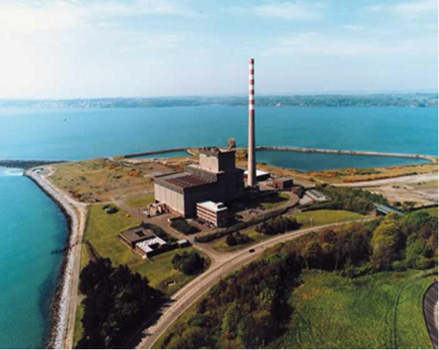 Industrial power station with chimneys, turbines and generation buildings at Aghada.