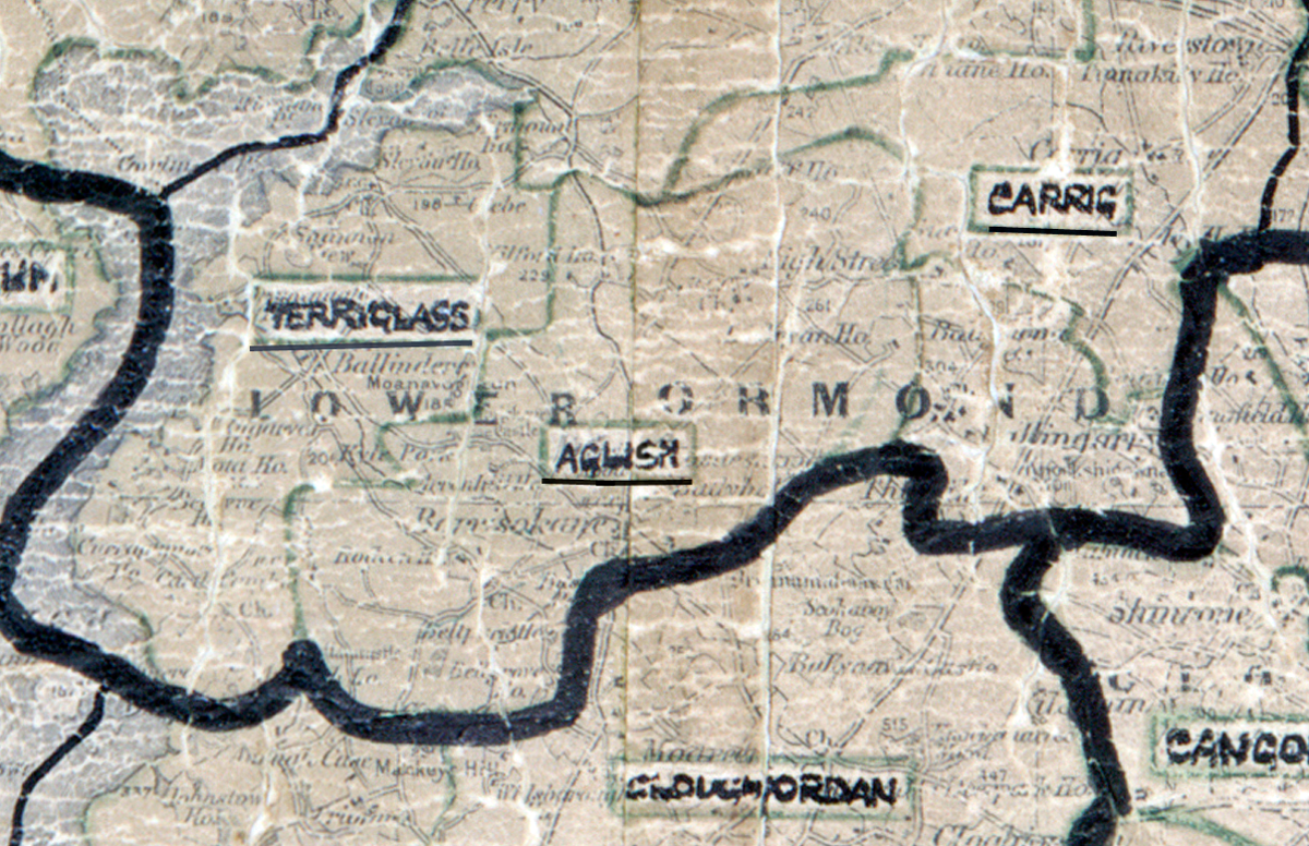 A scanned, worn historical map from the 1940s of the rural electrification area around Aglish. A hand‑drawn boundary outlines the region, including Carrig and terriglass.