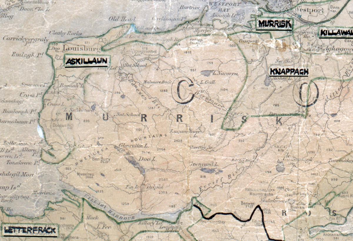 A scanned, worn historical map from the 1940s of the rural electrification area around Askillaun. A hand‑drawn boundary outlines the region, including Knaooagh and Murrisk.