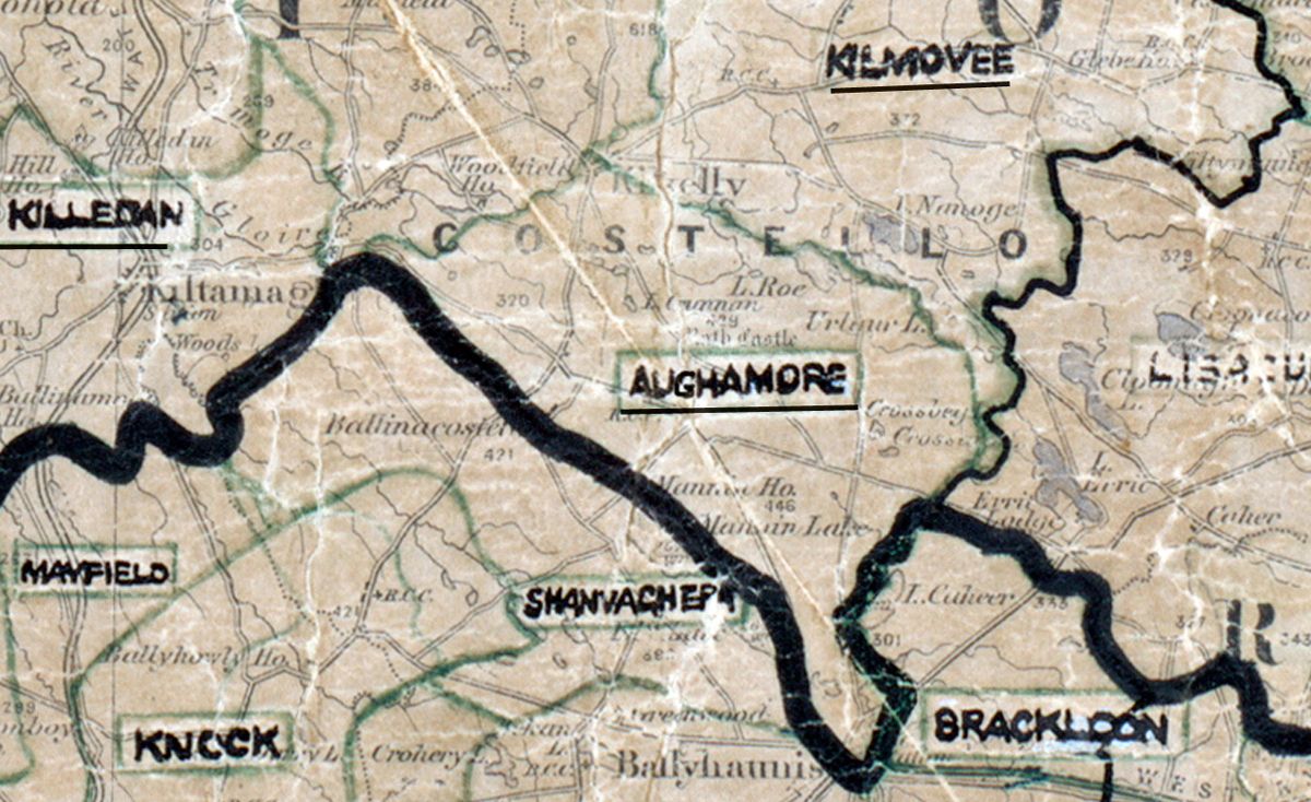 A scanned, worn historical map from the 1940s of the rural electrification area around Aughmore. A hand‑drawn boundary outlines the region, including Brackloon and Kilmovee.