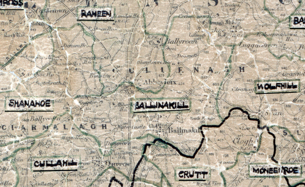 A scanned, worn historical map from the 1940s of the  	rural electrification area around Ballinakill. A hand‑drawn boundary outlines the region, including Raheen, Shanahoe, Wolfhill, Crutt and Moneenroe.