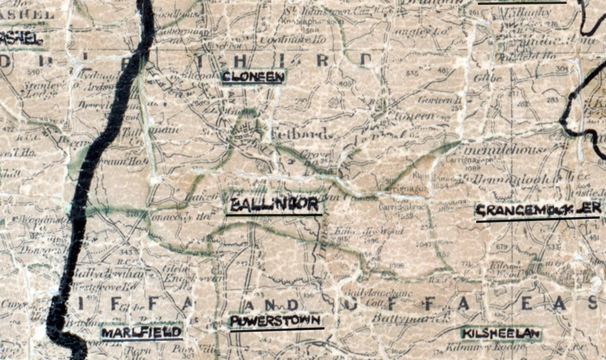 A scanned, worn historical map from the 1940s of the rural electrification area around Ballinure. A hand‑drawn boundary outlines the region, including Powerstown and Cloneen.