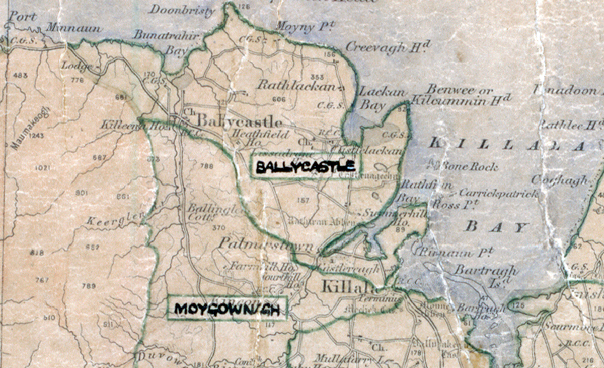 A scanned, worn historical map from the 1940s of the rural electrification area around Ballycastle. A hand‑drawn boundary outlines the region, including Moygownigh.
