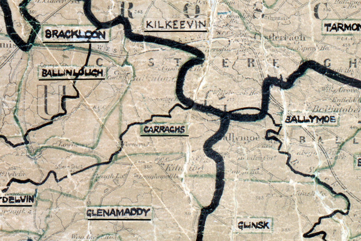 A scanned, worn historical map from the 1940s of the  rural electrification area around Carraghs. A hand‑drawn boundary outlines the region, including Kilkeevin, Tarmon, Blackloon, Ballinlough, Ballymoe, Glenamaddy and Glinsk.