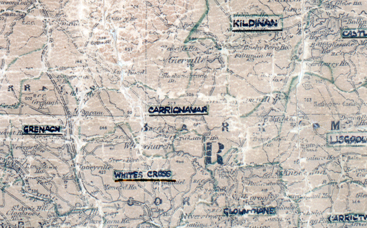 A scanned, worn historical map from the 1940s of the  rural electrification area around  Carrignavar. A hand‑drawn boundary outlines the region, including Grenagh, Kildinan, Whites Cross and Glounthane.