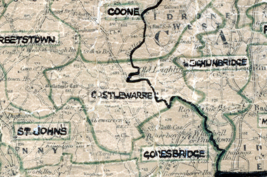 “A scanned, worn historical map from the 1940s of the rural electrification area around Castlewarren. A hand‑drawn boundary outlines the region, including St. Johns and Coone.