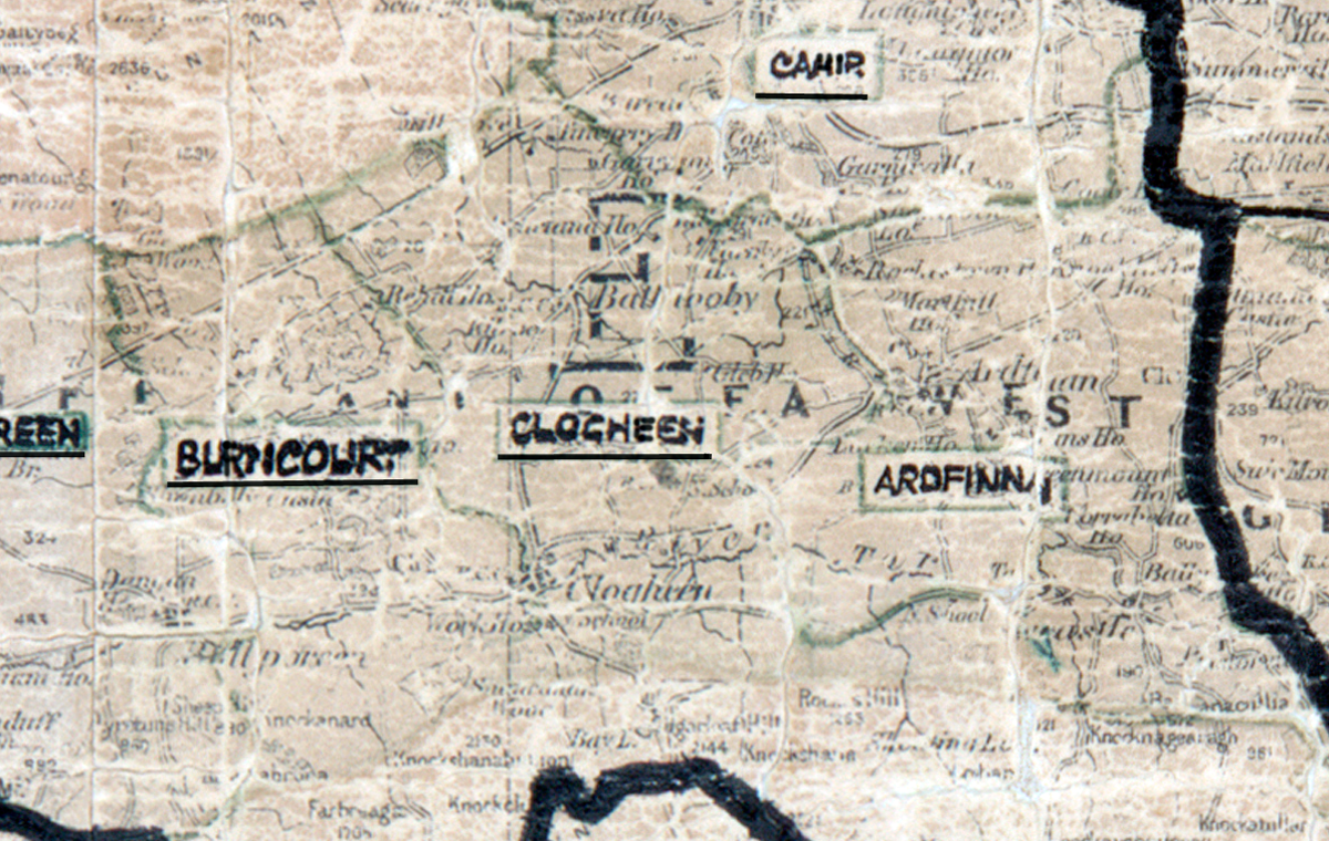 “A scanned, worn historical map from the 1940s of the rural electrification area around Clogheen. A hand‑drawn boundary outlines the region, including Burncourt and Arofinn.