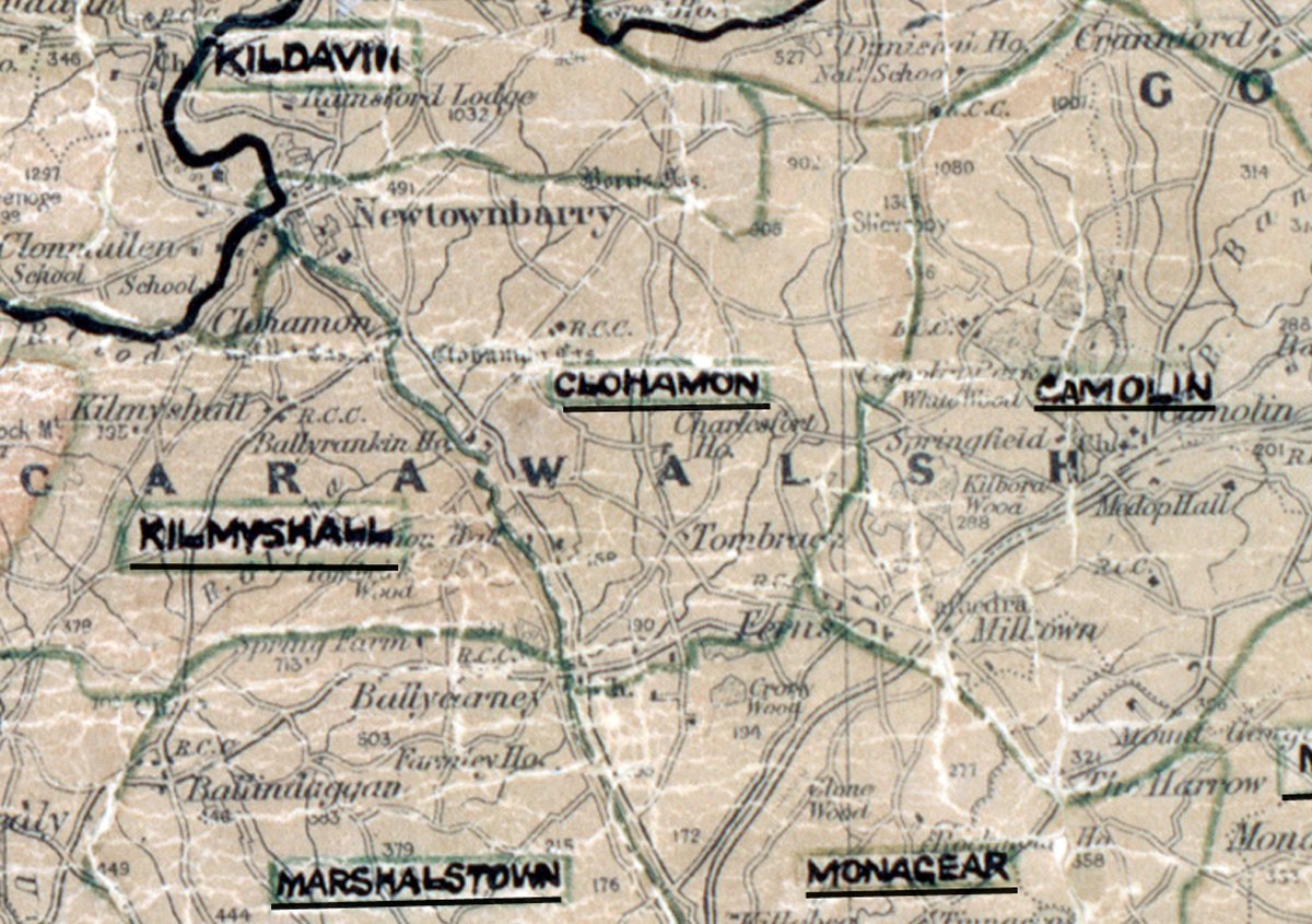 “A scanned, worn historical map from the 1940s of the rural electrification area around Clonhamon. A hand‑drawn boundary outlines the region, including Camolin and Monagear.