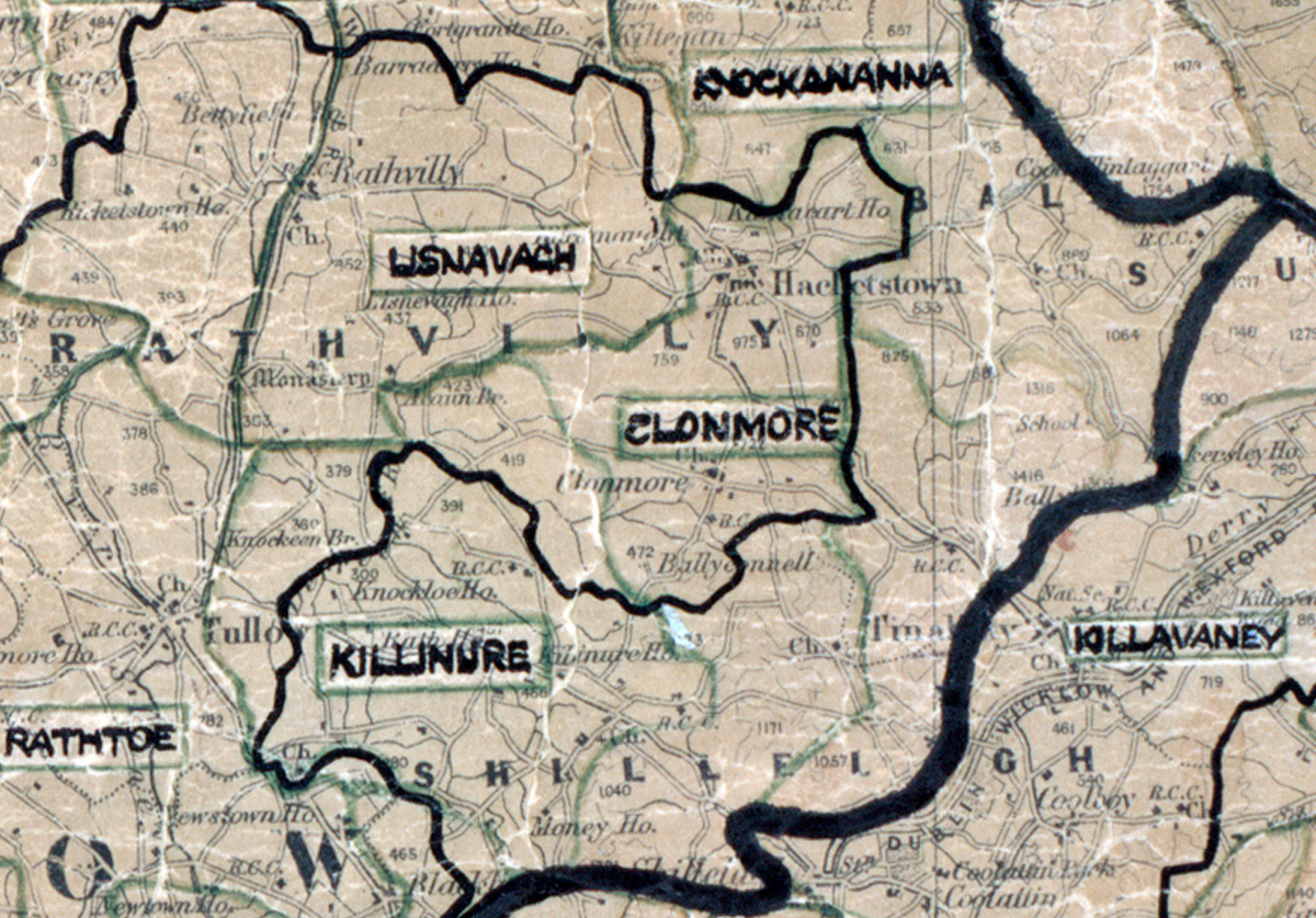 A scanned, worn historical map from the 1940s of the  rural electrification area around Clonmore. A hand‑drawn boundary outlines the region, including Lisnavagh, Rathoe, Knockannana and Killinure.