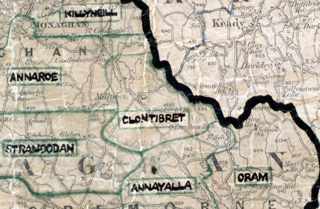 “A scanned, worn historical map from the 1940s of the rural electrification area around Clontibret. A hand‑drawn boundary outlines the region, including Oram and Annayalla.