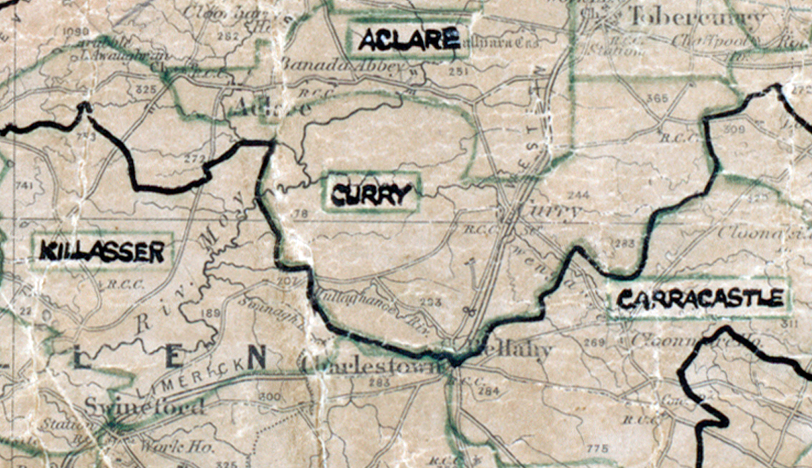 A scanned, worn historical map from the 1940s of the  rural electrification area around Curry. A hand‑drawn boundary outlines the region, including Aclare, Curry, Killasser and Carracastle.