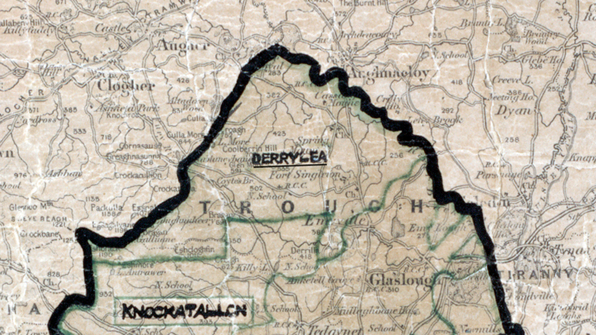 “A scanned, worn historical map from the 1940s of the rural electrification area around Derrylea]. A hand‑drawn boundary outlines the region, including Knockatallon