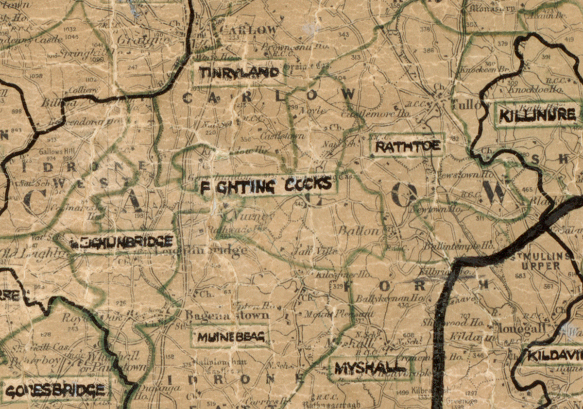 A scanned, worn historical map from the 1940s of the rural electrification area around Fighting Cocks. A hand‑drawn boundary outlines the region, including Tinryland, Carlow, Rathoe, Killinure, Leighlinbridge, Muinebeag, and Myshall.