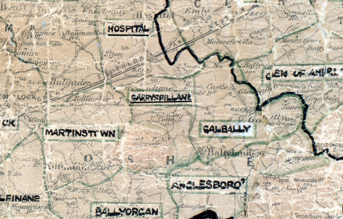 A scanned, worn historical map from the 1940s of the rural electrification area around Garryspillane. A hand-drawn boundary outlines the region.
