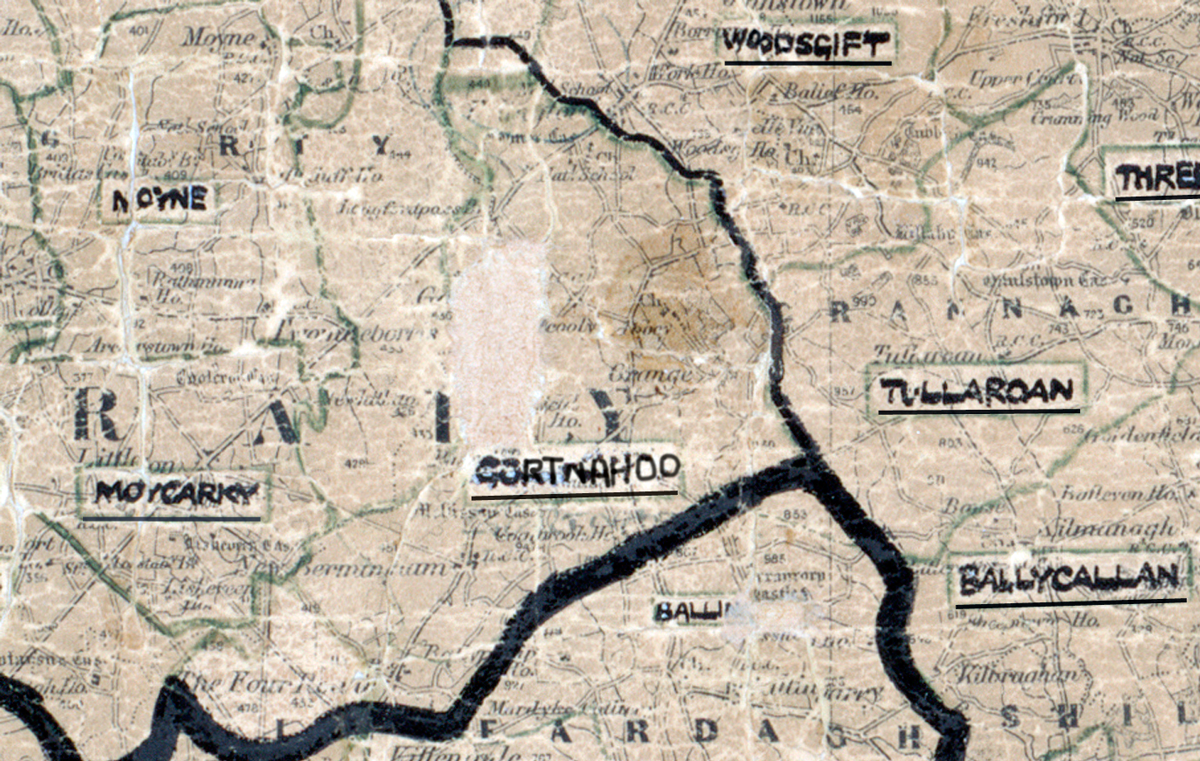 A scanned, worn historical map from the 1940s of the rural electrification area around Gortnahoo. A hand‑drawn boundary outlines the region, including Woodsgift, Moyne, Moycarkey, Tullaroan, Ballycallan, and Three Castles.
