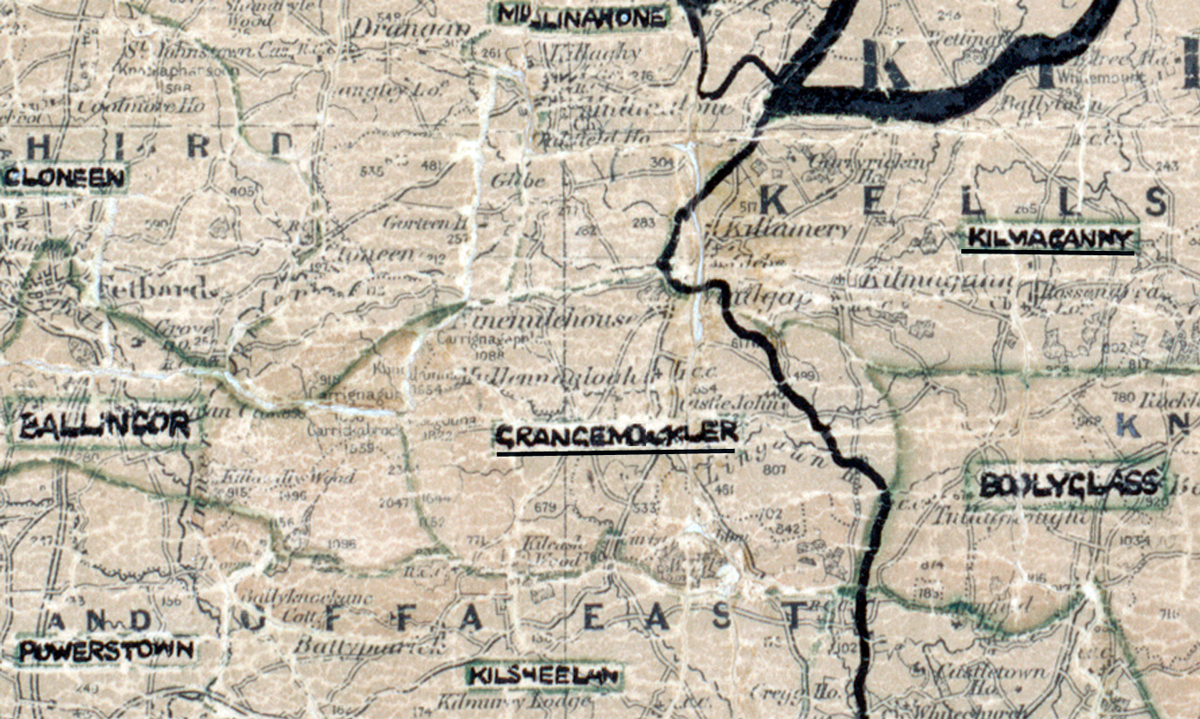 A scanned, worn historical map from the 1940s of the rural electrification area around Grangemockler. A hand‑drawn boundary outlines the region, including Ballingarry, Cloneen, Mullinahone, Kilmaganny, Ballyclass, Powerstown, Kilsheelan, and Rathgormack.