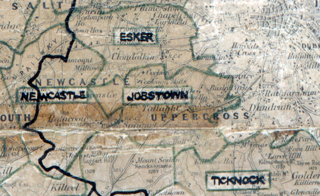 A scanned, worn historical map from the 1940s of the rural electrification area around Jobstown. A hand‑drawn boundary outlines the region, including Esker, Newcastle and Ticknock.