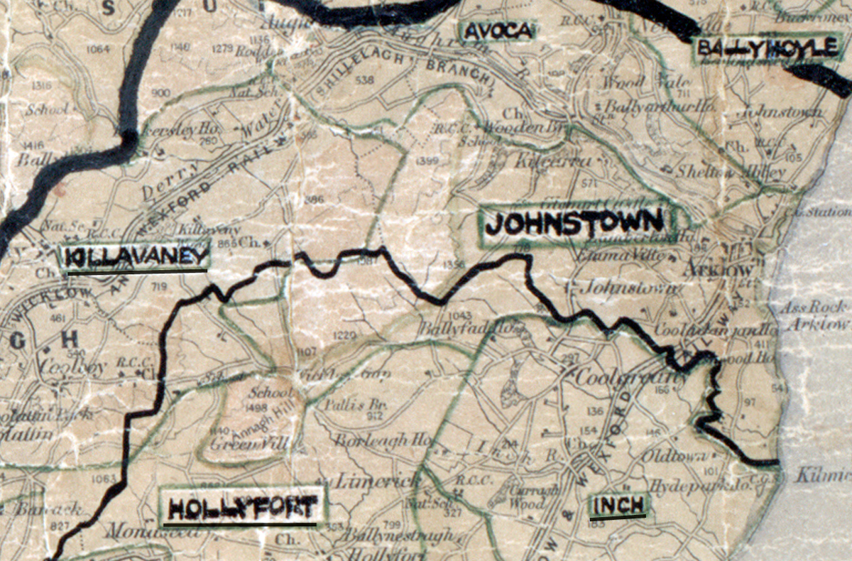 A scanned, worn historical map from the 1940s of the rural electrification area around Johnstown. A hand‑drawn boundary outlines the region, including Inch, Ballymoyle, Avoca, Killavaney and Hollyfort.