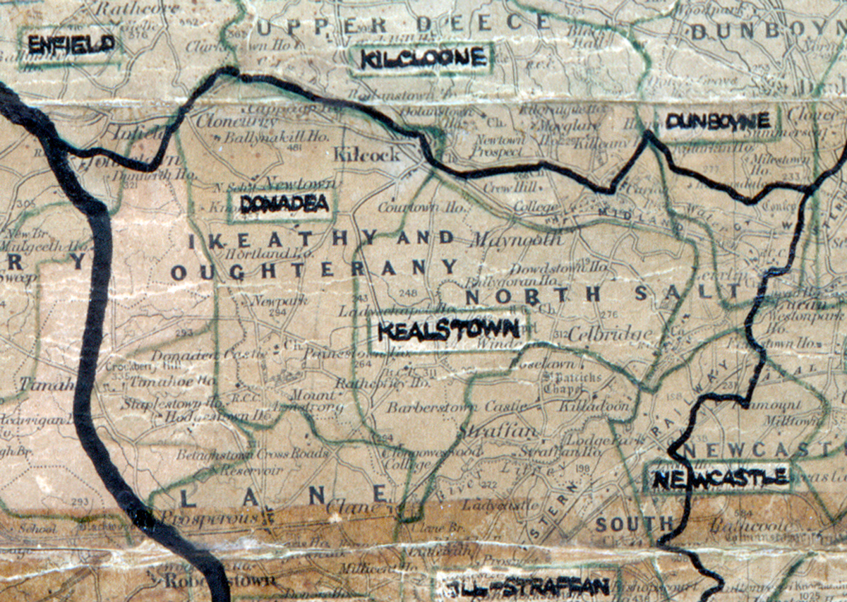 A scanned, worn historical map from the 1940s of the  rural electrification area around Kealstown. A hand‑drawn boundary outlines the region, including Enfield, Kilcoone, Dunboyne, Donadea and Newcastle.