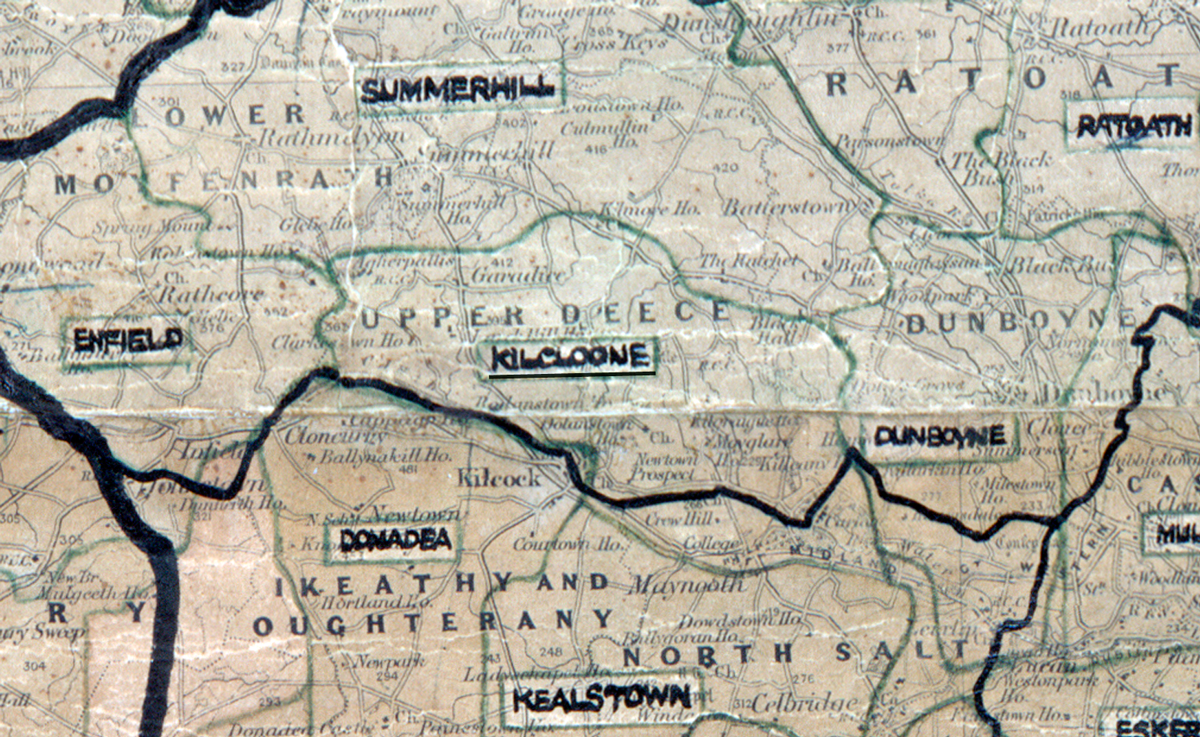 A scanned, worn historical map from the 1940s of the  rural electrification area around Kilclone. A hand‑drawn boundary outlines the region, including Summerhill, Ratoath, Enfield, Kilcloone, Dunboyne and Kealstown.