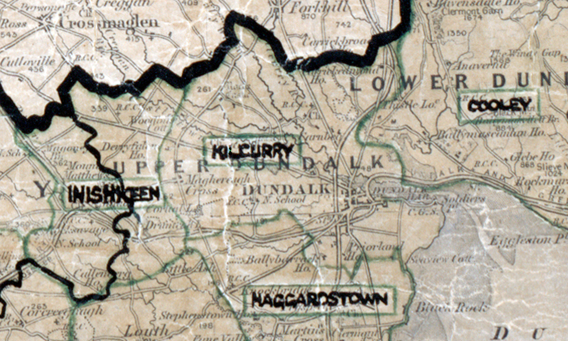 A scanned, worn historical map from the 1940s of the rural electrification area around Kilcurry. A hand‑drawn boundary outlines the region, including Iniskeen, Haggardstown, and Cooley.