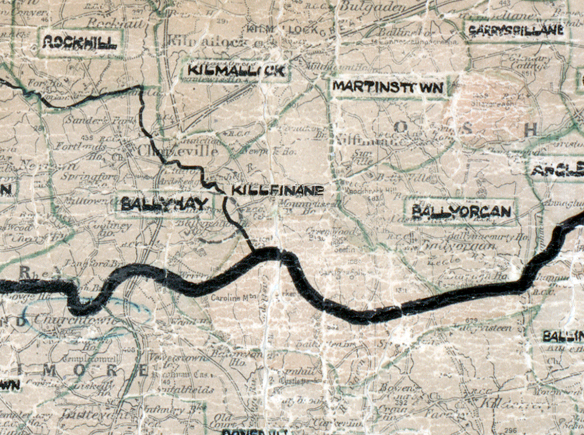 A scanned, worn historical map from the 1940s of the rural electrification area around Kilfinnane. A hand‑drawn boundary outlines the region, including Rockhill, Kilmallock, Martinsstown, and Ballyvorcan.