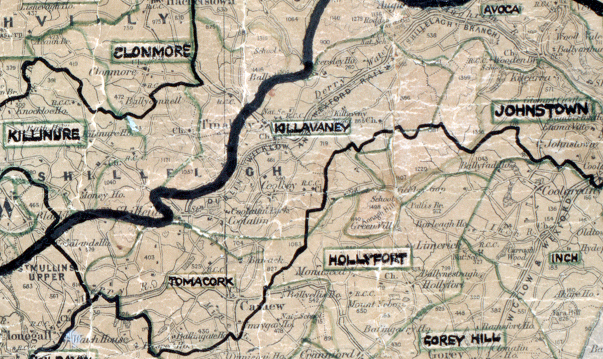 A scanned, worn historical map from the 1940s of the rural electrification area around Killaveny. A hand‑drawn boundary outlines the region, including Johnstown, Tomacork and Hollyfort.