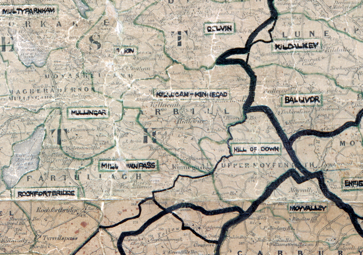 A scanned, worn historical map from the 1940s of the rural electrification area around Killucan–Kinnegad. A hand‑drawn boundary outlines the region, including Mullingar, Milltownpass, Rochfortbridge, Hill of Down, Ballyvor, Enfield, and Moyvalley.