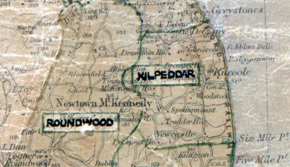 A scanned, worn historical map from the 1940s of the rural electrification area around Kilpeddar. A hand‑drawn boundary outlines the region, including Roundwood.