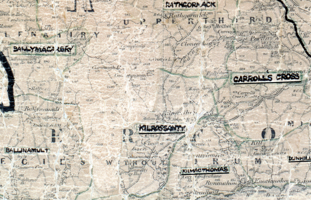 A scanned, worn historical map from the 1940s of the rural electrification area around Kilrossanty. A hand‑drawn boundary outlines the region, including Ballymacarbry, Ballynamult, Kilmacthomas, Carrolls Cross, Rathgormack, and Dunhill.