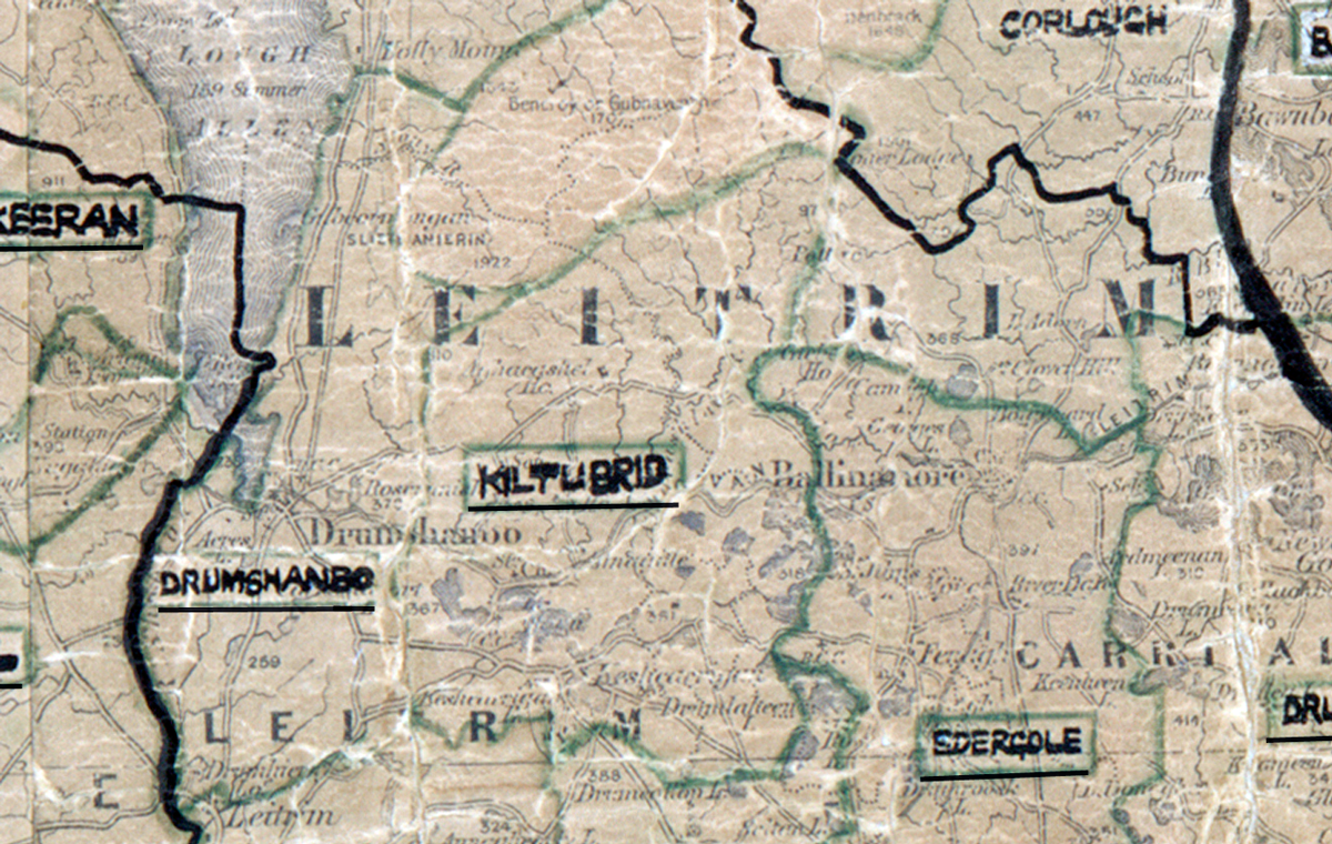 A scanned, worn historical map from the 1940s of the rural electrification area around Kiltubrid. A hand‑drawn boundary outlines the region, including Drumshanbo, Drumkeeran, and Ederrole.