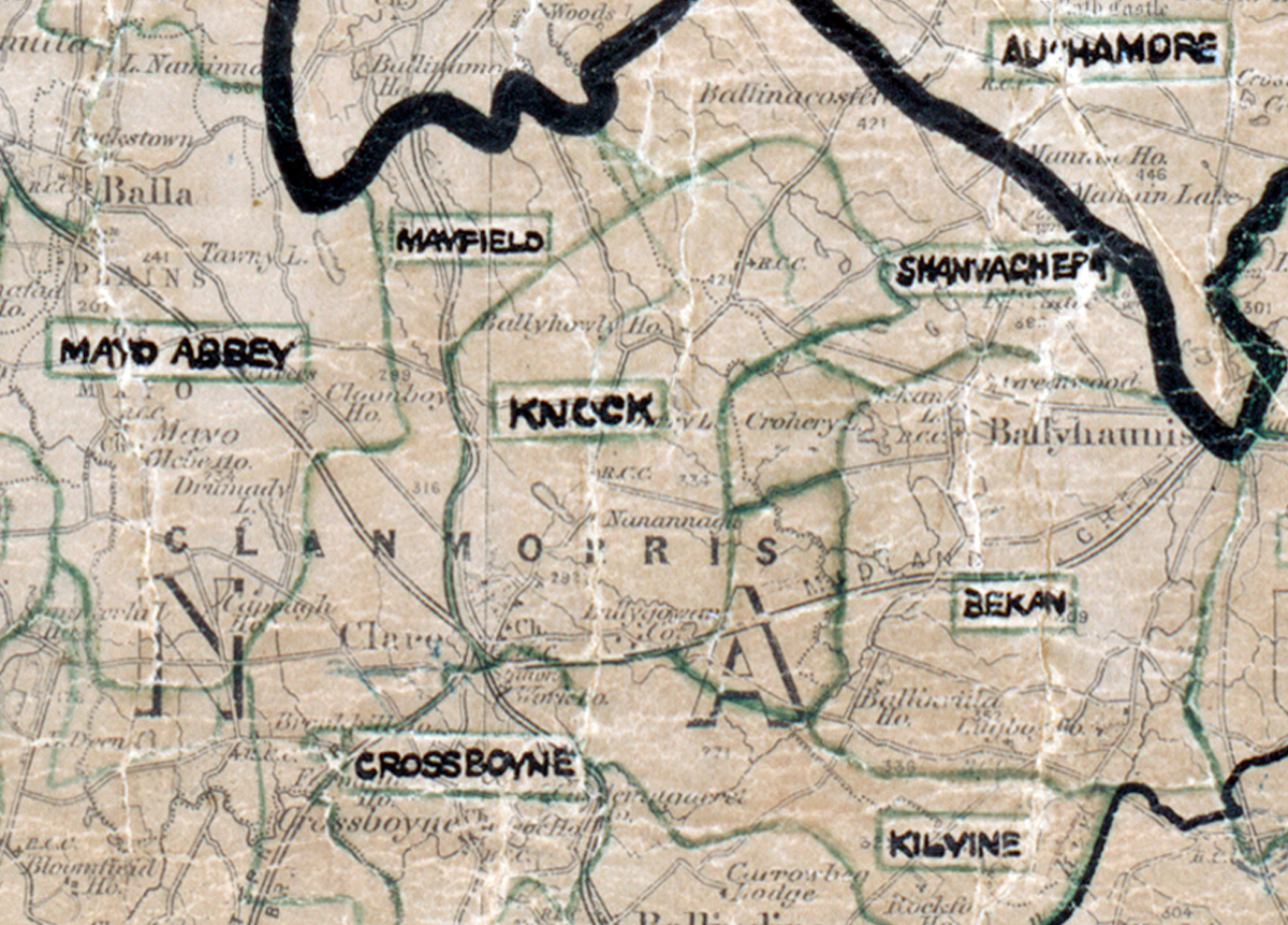 A scanned, worn historical map from the 1940s of the rural electrification area around Knock. A hand‑drawn boundary outlines the region, including Mayo Abbey, Manfield, Crossboyne, Bekan, Shanvagher, and Kilyne.