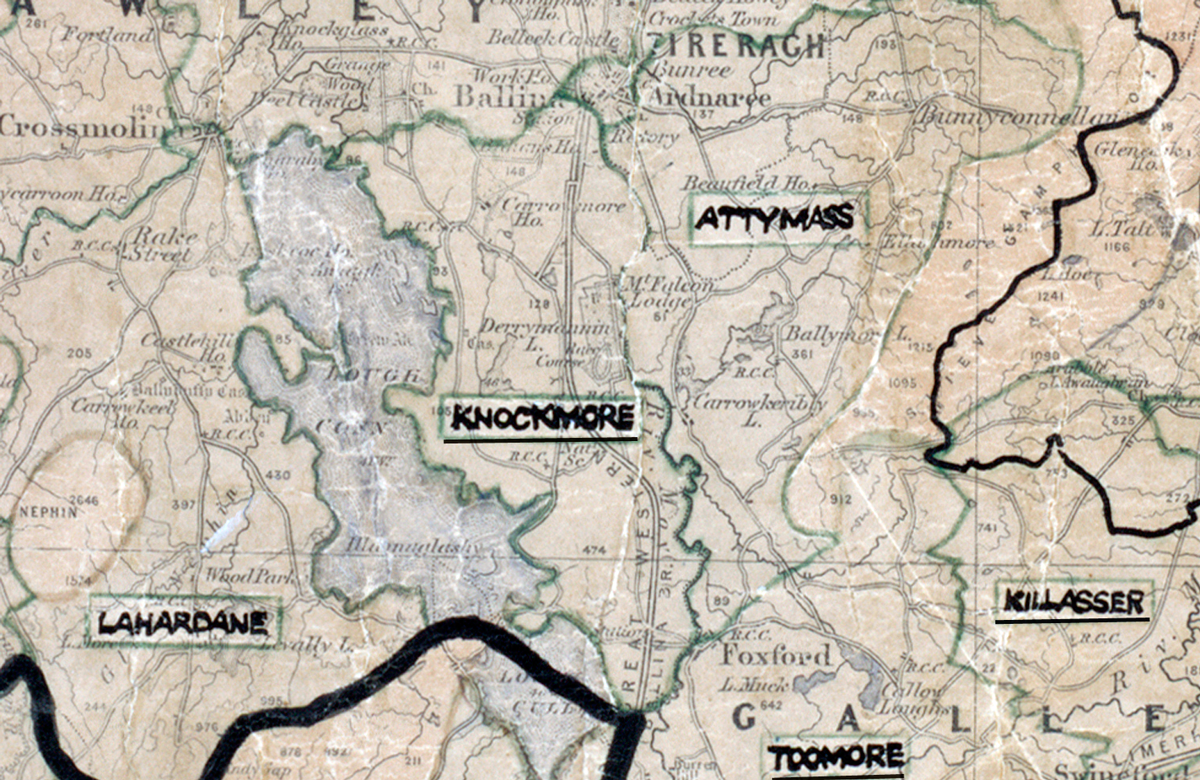 A scanned, worn historical map from the 1940s of the rural electrification area around Knockmore. A hand‑drawn boundary outlines the region, including Lahardane, Attyass, Killasser, Toomore, and Glenhest.