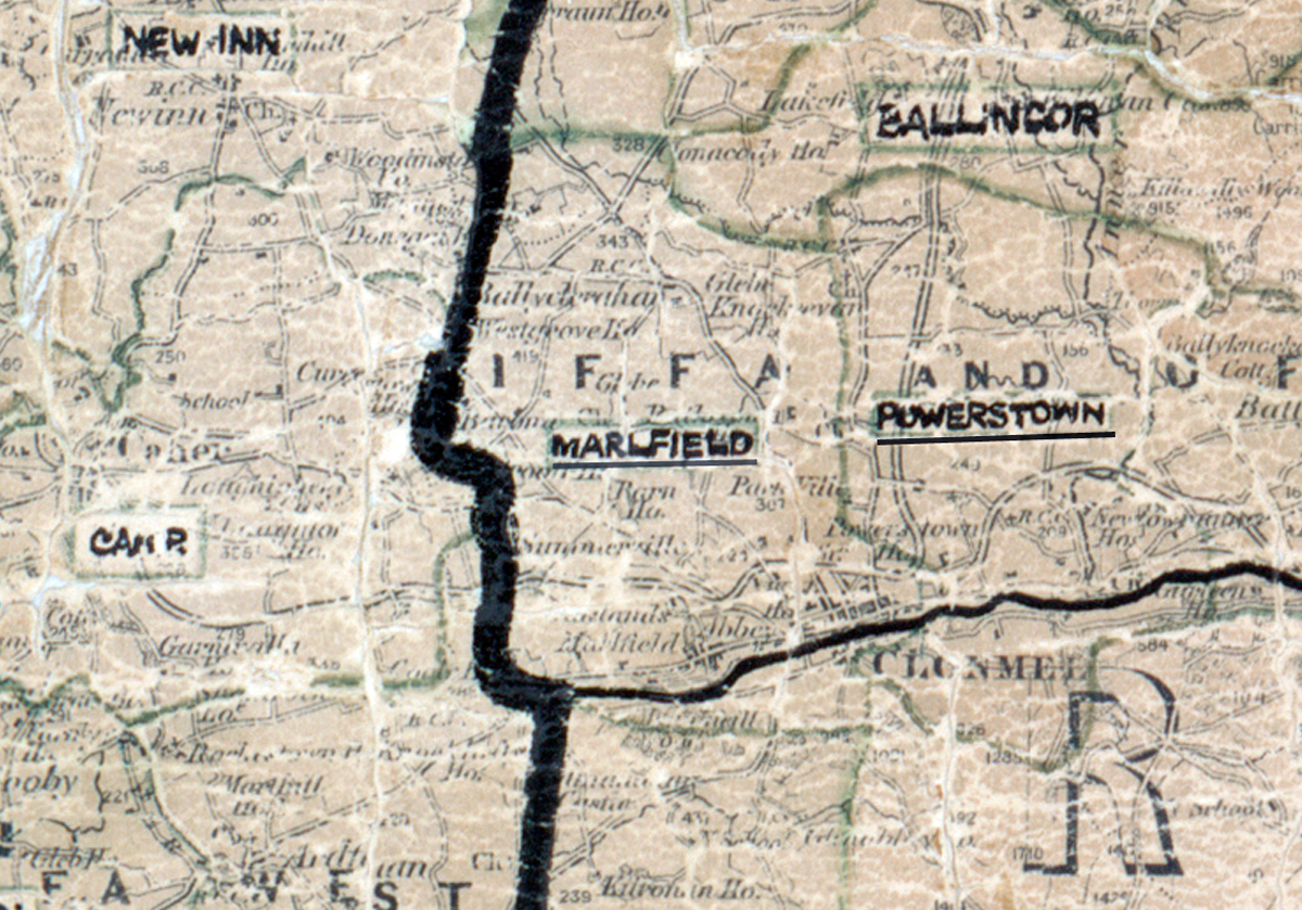 A scanned, worn historical map from the 1940s of the rural electrification area around Marlfield. A hand‑drawn boundary outlines the region, including New Inn, Powerstown, Ballingarry, and Cashel.