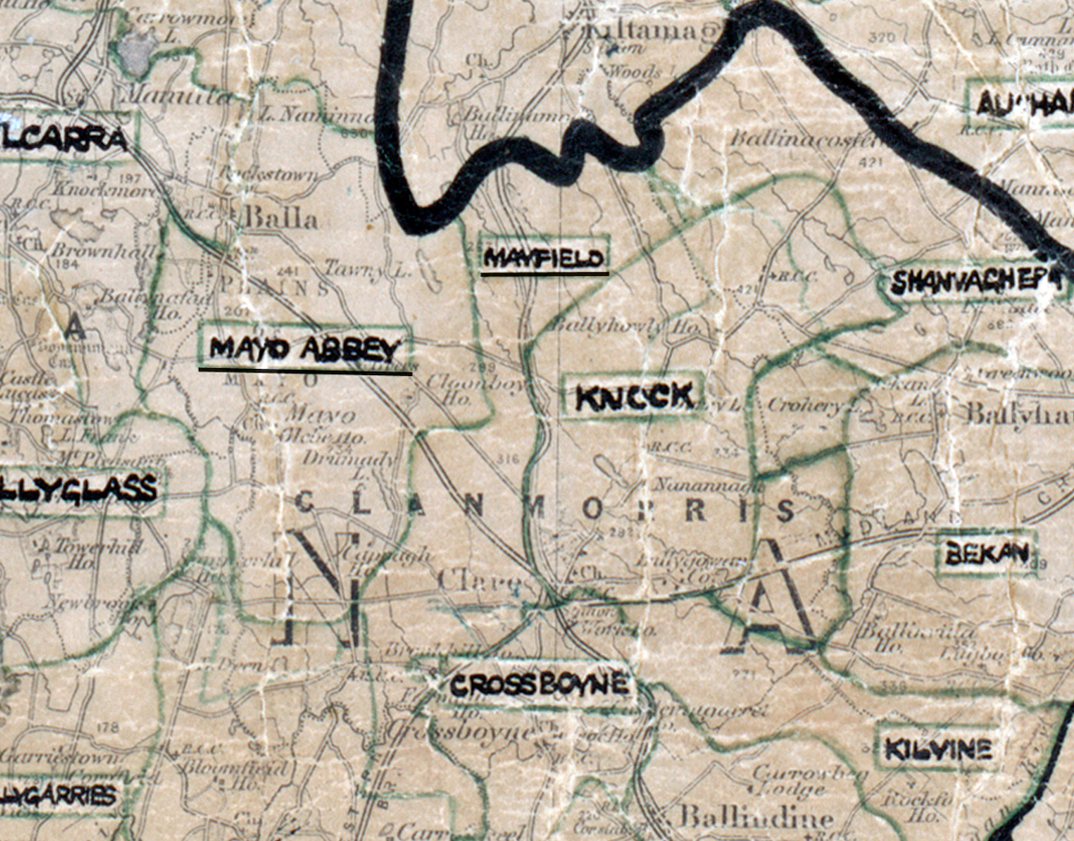A scanned, worn historical map from the 1940s of the rural electrification area around Mayo Abbey. A hand‑drawn boundary outlines the region, including Manfield, Knock, Crossboyne, Bekan, Kilyne, and Shanvagher.