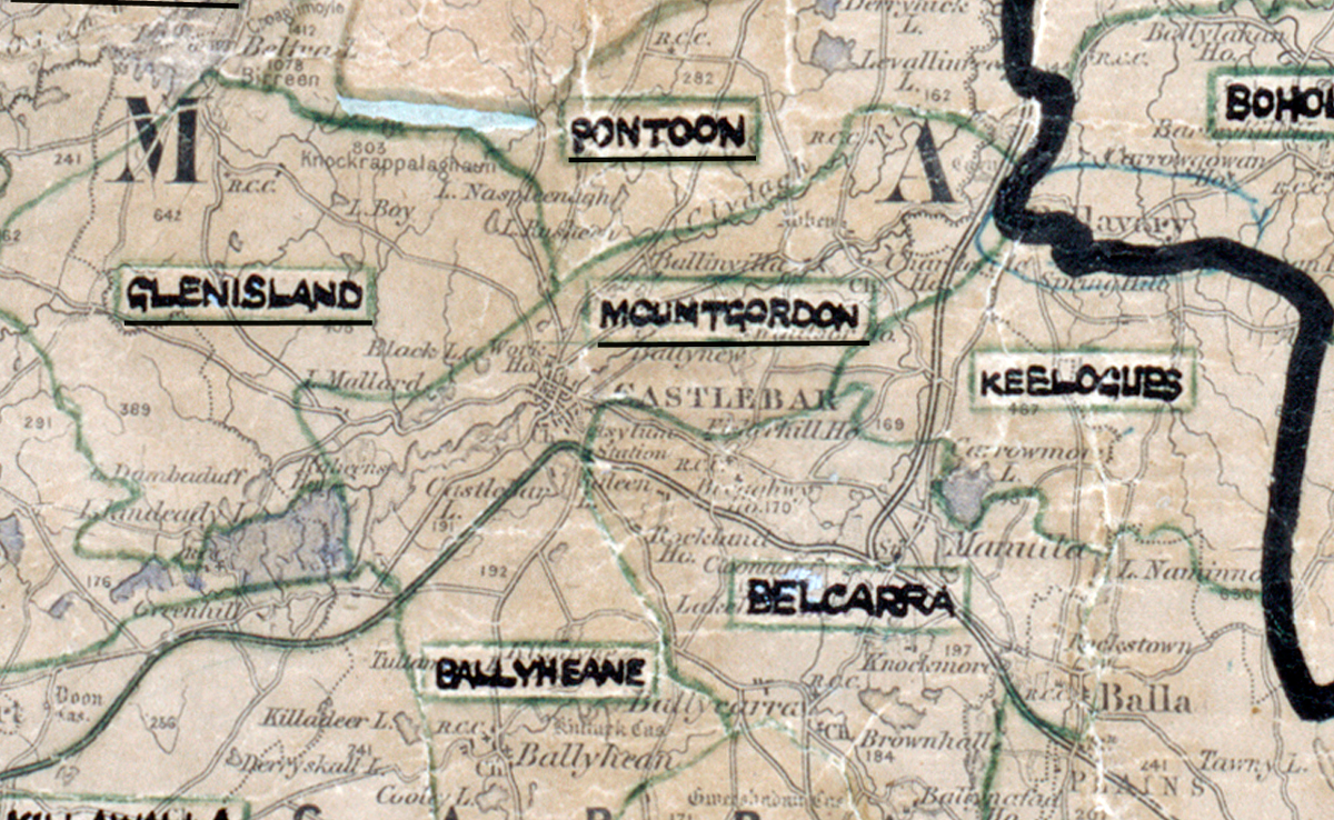 A scanned, worn historical map from the 1940s of the rural electrification area around Mountgordon. A hand‑drawn boundary outlines the region, including Glenisland, Pontoon, Belcarra, Ballyheane, and Keelgues.