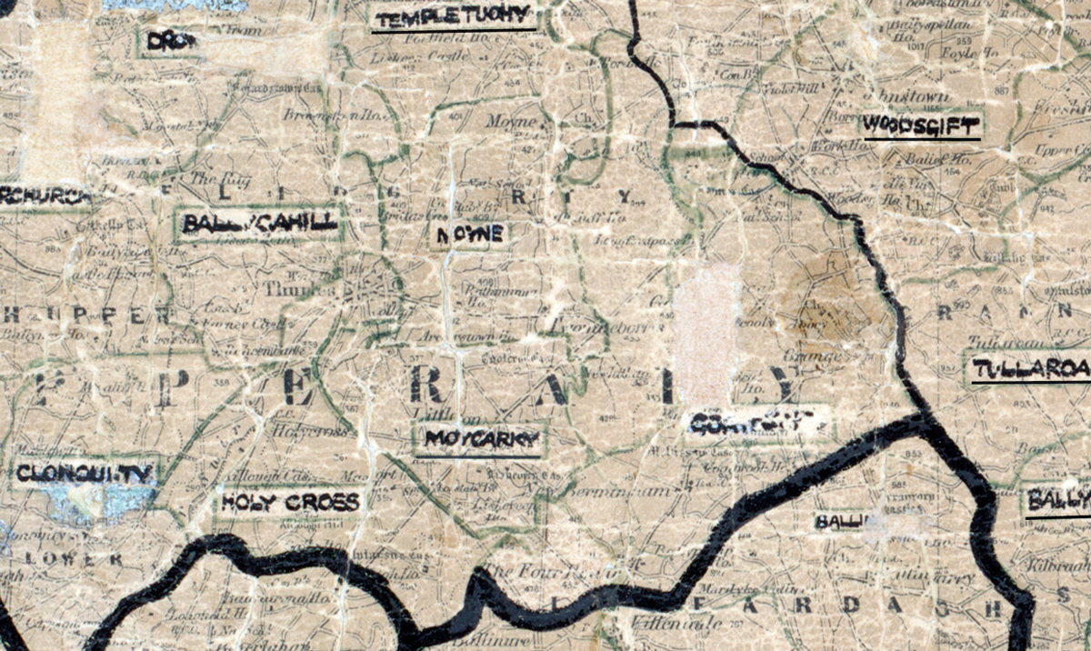 A scanned, worn historical map from the 1940s of the rural electrification area around Moycarky. A hand‑drawn boundary outlines the region, including Ballycahill, Moyne, Templetuohy, Woodsgift, Tullaroan, Clonoulty, and Holy Cross.