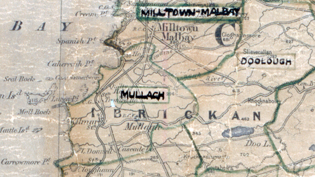 A scanned, worn historical map from the 1940s of the rural electrification area around Mullagh. A hand‑drawn boundary outlines the region, including Milltown Malbay, and Doolough.