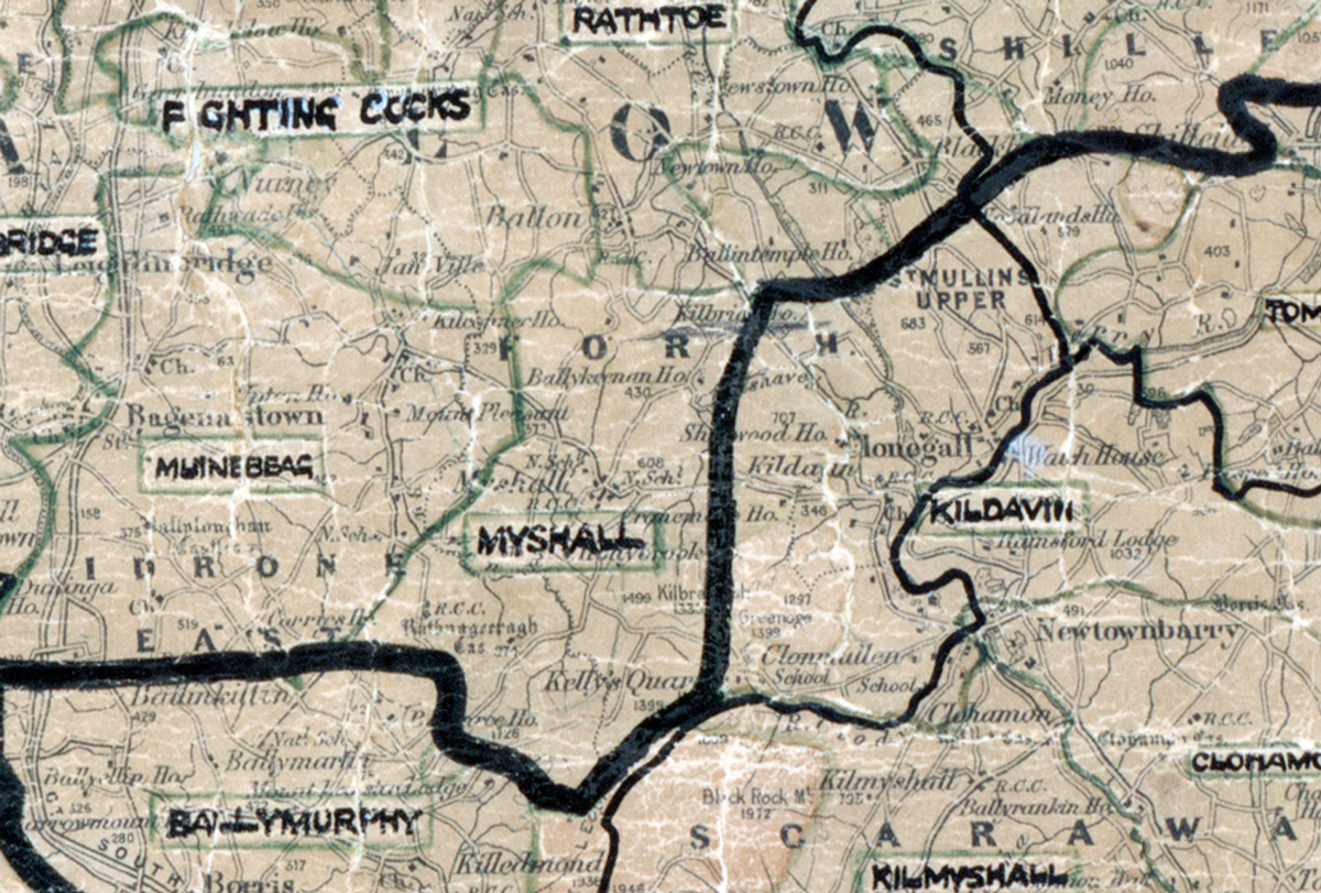 A scanned, worn historical map from the 1940s of the  rural electrification area around Myshall. A hand‑drawn boundary outlines the region, including Rathtoe, Fighting Cocks, Muinebbag, Killdavin, Ballymurphy and Kilmyshall.