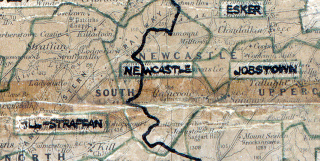 “A scanned, worn historical map from the 1940s of the rural electrification area around Newcastle. A hand‑drawn boundary outlines the region, including Josbtown and Esker”