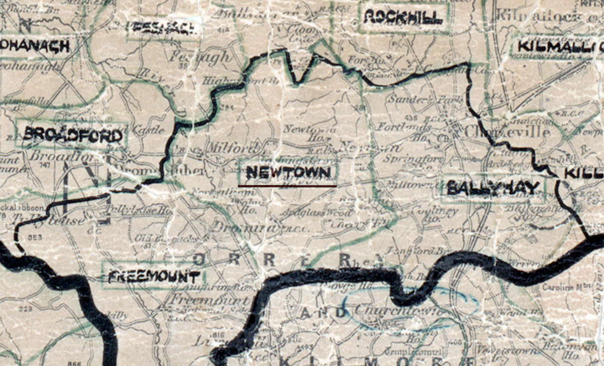 A scanned, worn historical map from the 1940s of the  	rural electrification area around Newtown. A hand‑drawn boundary outlines the region, including Broadford, Freemount, Rockhill and Ballyhay.