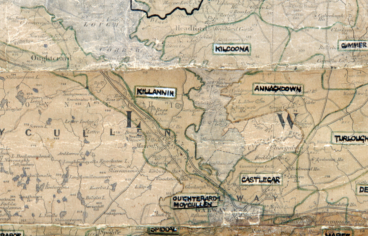 A scanned, worn historical map from the 1940s of the rural electrification area around Oughterard. A hand‑drawn boundary outlines the region, including Kilcoona, Cummer, Killannin, Annachdown, Turloughmore, Castlecar,, and Moycullen.