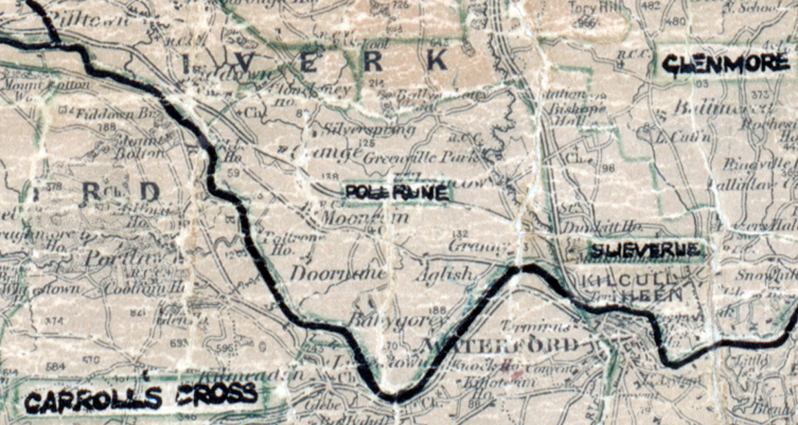 A scanned, worn historical map from the 1940s of the rural electrification area around Pollroan. A hand‑drawn boundary outlines the region, including Glenmore, Slieverue, and Carrolls Cross.