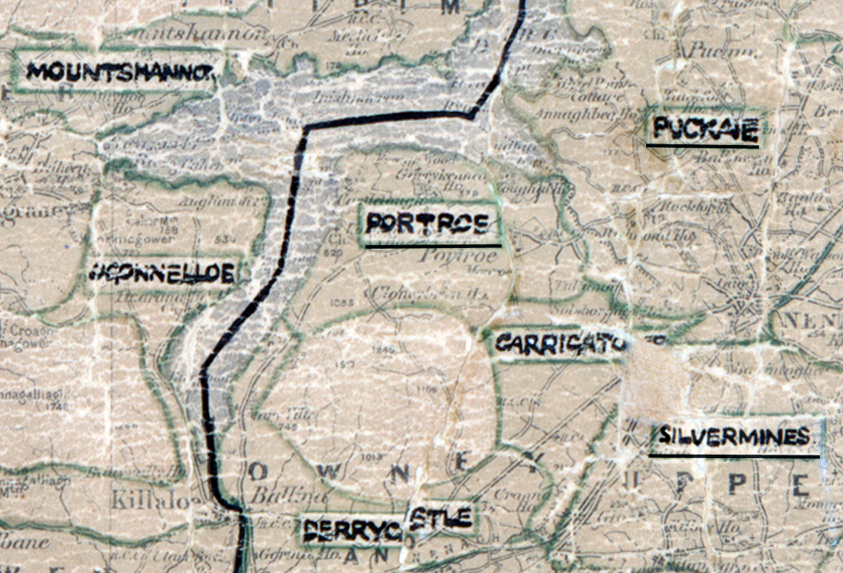 A scanned, worn historical map from the 1940s of the rural electrification area around Portroe. A hand‑drawn boundary outlines the region, including Mountshannon, Puckaun, Derrycastle, Silvermines, and Carrigatoher.