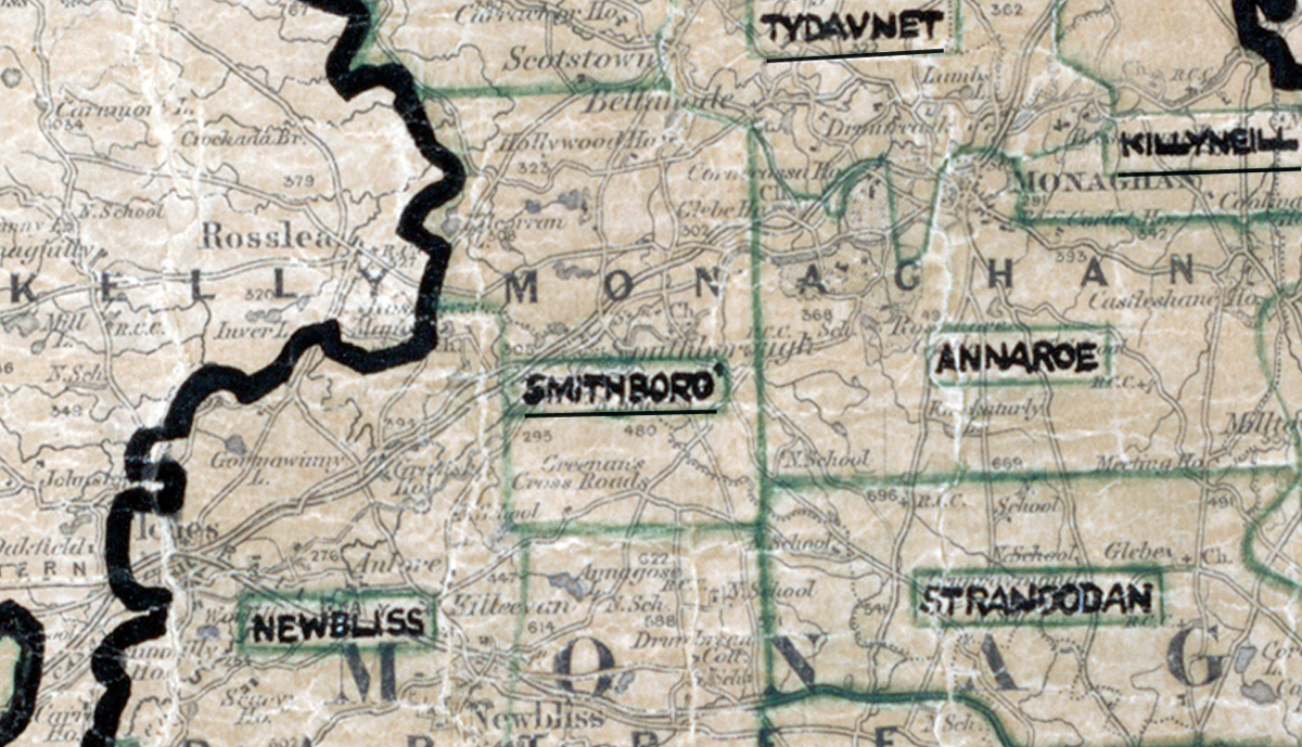 A scanned, worn historical map from the 1940s of the rural electrification area around Smithboro. A hand‑drawn boundary outlines the region, including Tydavnet, Killyneill, Annaroe, Stranoodan, Newbliss, and Rosslea.