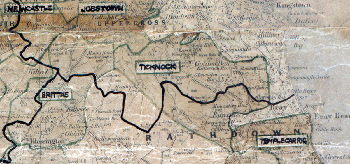 A scanned, worn historical map from the 1940s of the rural electrification area around Ticknock. A hand‑drawn boundary outlines the region, including Templecarrig, Brittas and Jobstown.