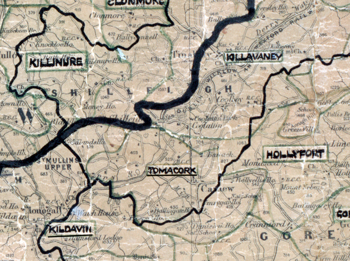 A scanned, worn historical map from the 1940s of the rural electrification area around Tomacork. A hand‑drawn boundary outlines the region, including Kilmurry, Killinure,Hollyfort, and Kildavin.