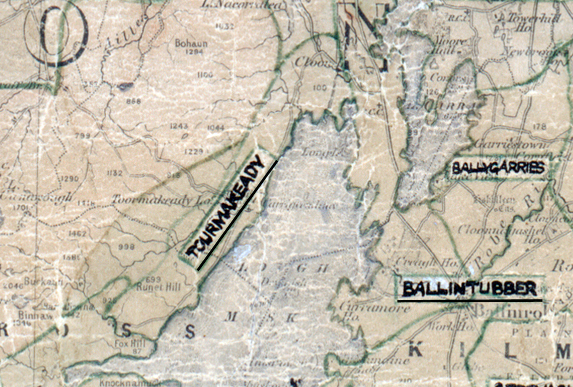 A scanned, worn historical map from the 1940s of the rural electrification area around Tourmakeady,. A hand‑drawn boundary outlines the region, including Ballygarries, and Ballintubber.